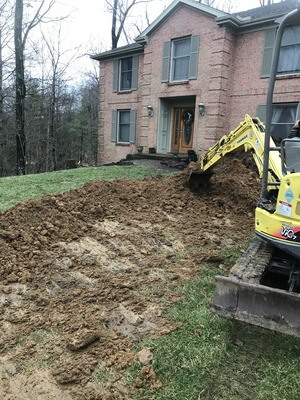 Digging-Up-Yard-To-Fix-Main-Line